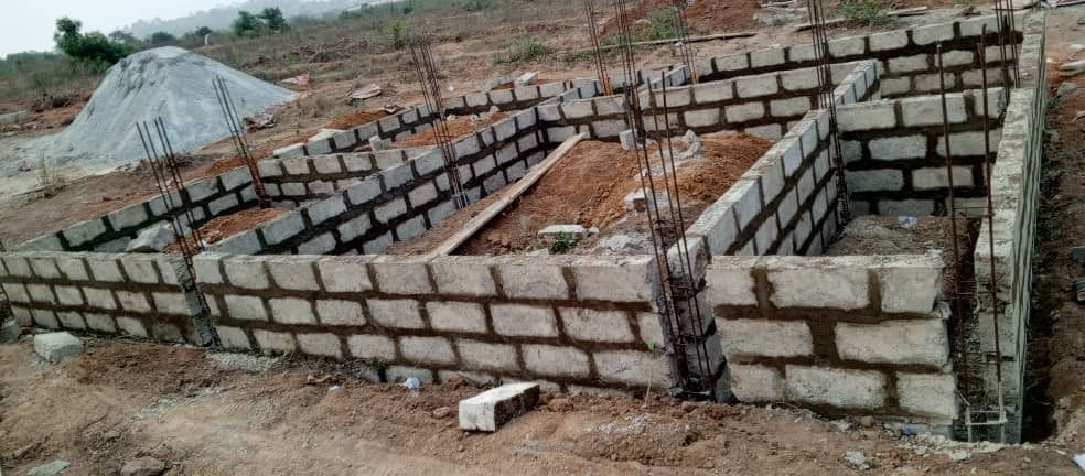 Perimeter fence and units under construction