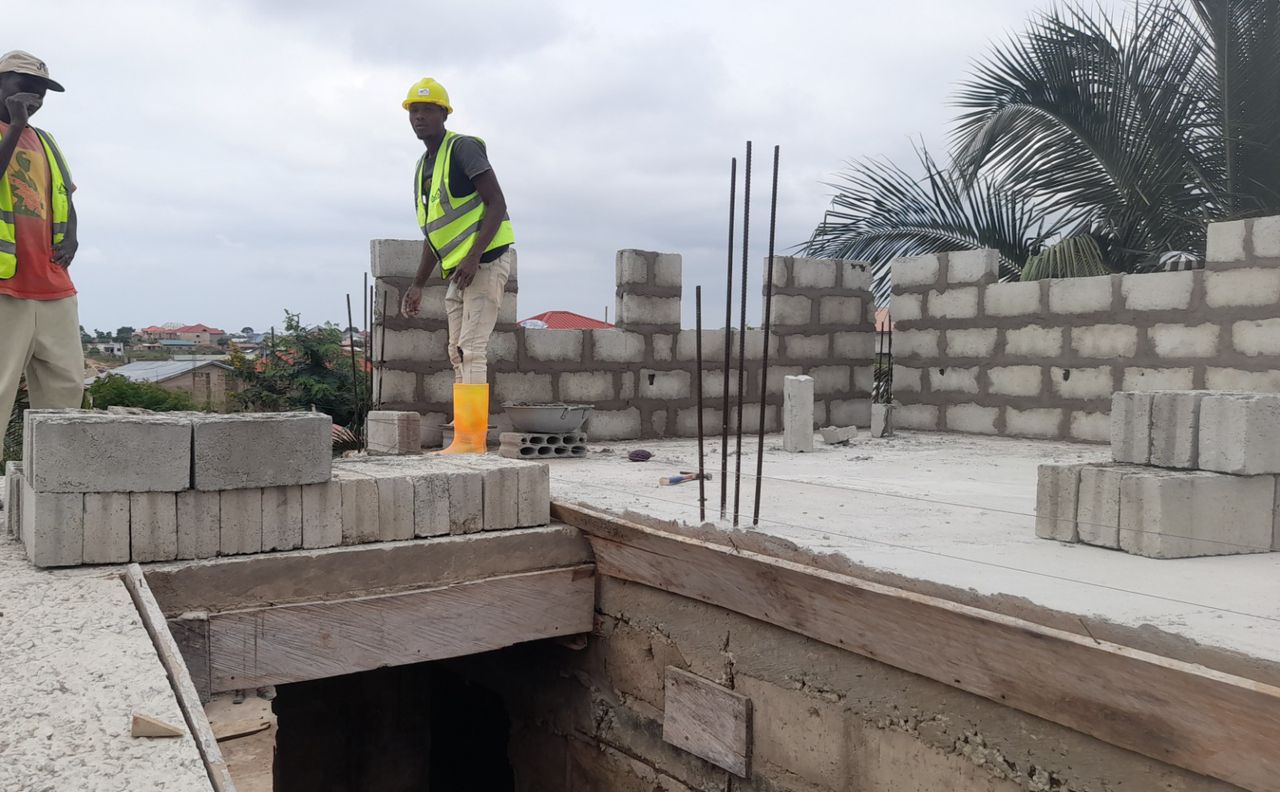 Mason laying blocks