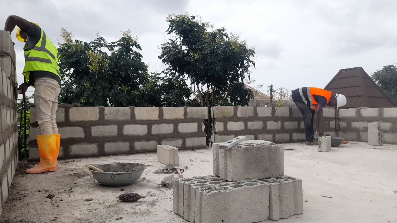Workers building at first floor level